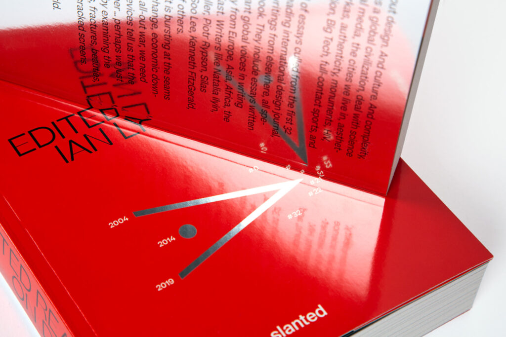 Reflective image showing the cover graphic mirrored onto the back of a further copy of the book.