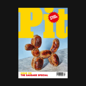 Pit magazine sausage issue cover featuring a sausage dog shaped out of the food item
